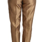 Dolce & Gabbana Elegant Tapered Silk Trousers in Gold