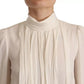 Dolce & Gabbana Off White Silk Long Sleeve Turtle Neck Top