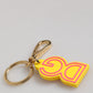Dolce & Gabbana Yellow Rubber Gold Tone Metal DG Logo Keyring Keychain Womens