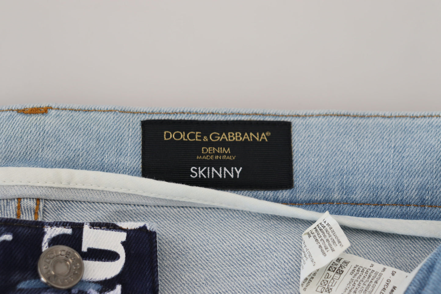 Dolce & Gabbana Elegant Crown Print Denim Pants